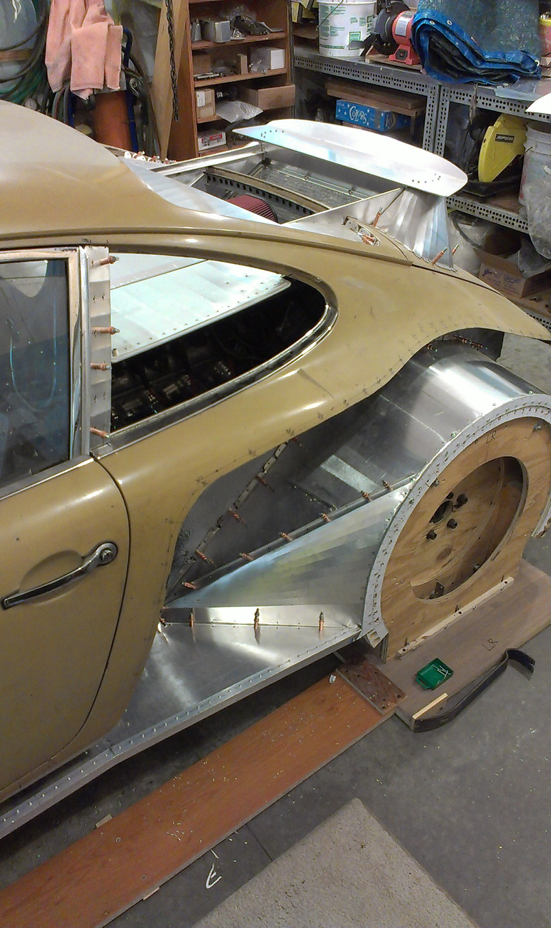 Trimming the rear bodywork down to fit the new fenders.